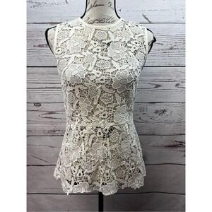 Cabi XS creme colored lacy sleeveless blouse with zipper in back‎